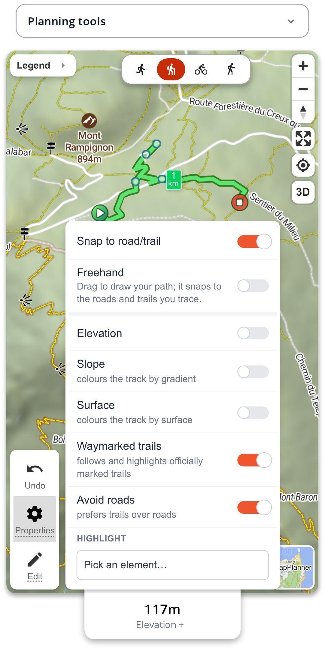 Map properties open on a smartphone in MapPlanner with the waymarked trails and avoid roads switches on, above a map where marked trails stand out